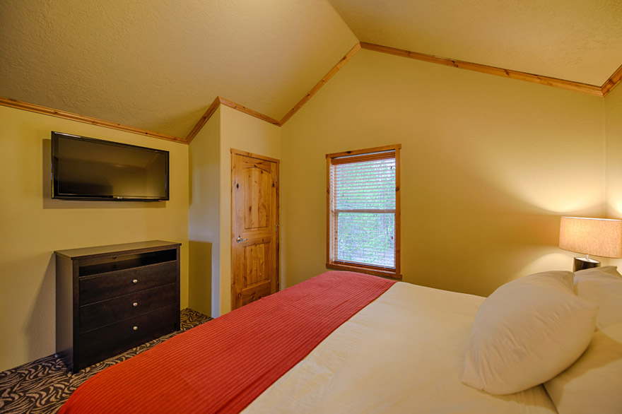 Interior Yellowstone cabin master bedroom