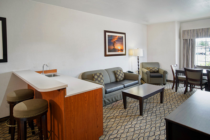 Executive Suite living room and bar seating at Holiday Inn West Yellowstone