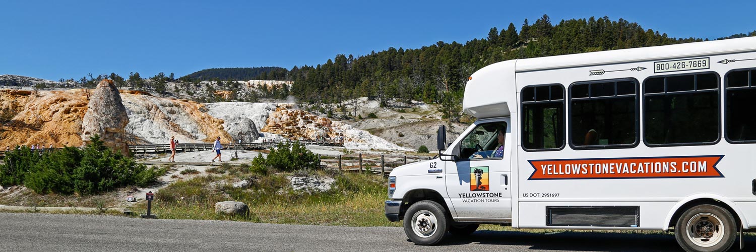 Yellowstone Vacation Tours bus at Mammoth Hot Springs