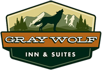 Gray Wolf Inn and Suites logo