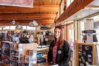 Canyon Adventure employee with Yellowstone merchandise