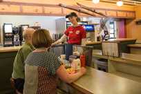 Fishing Bridge server helping customers