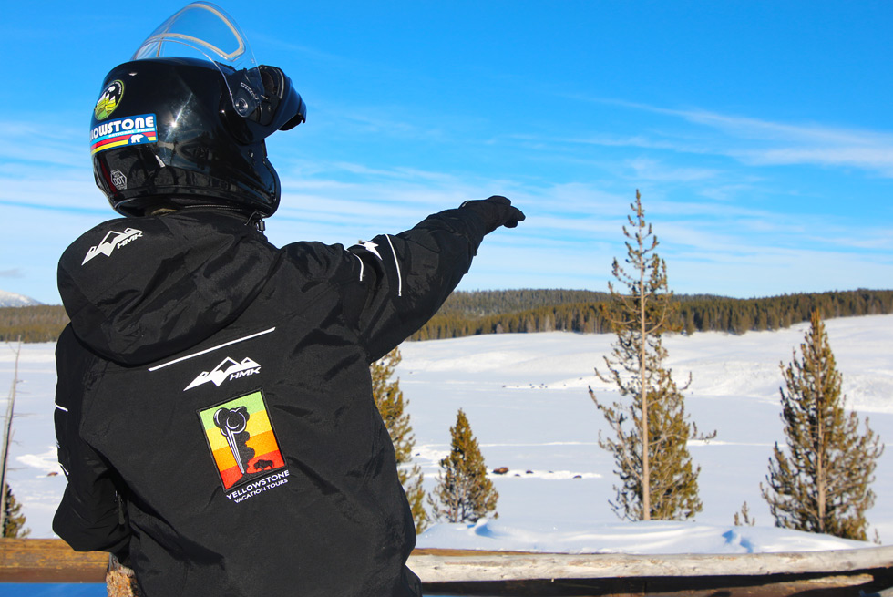 Yellowstone Vacations guide pointing out the sights